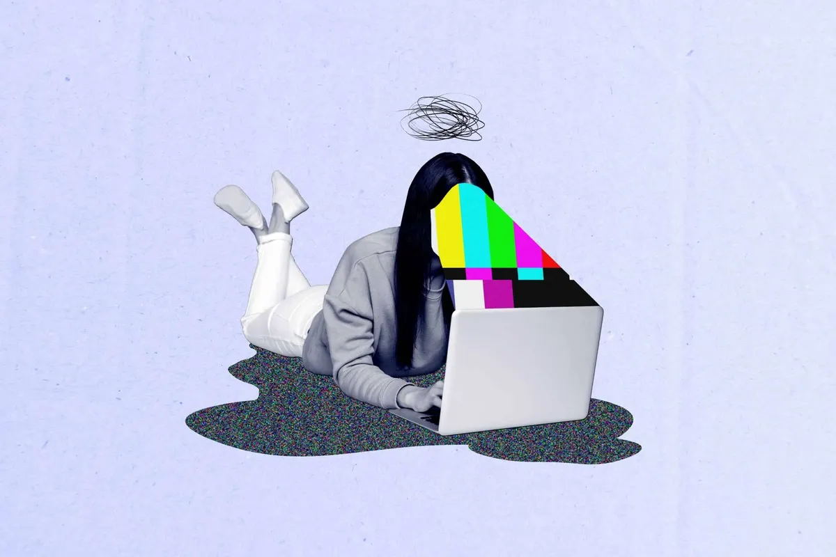 A designer laying out brand artwork